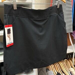 Cute skort with two pockets. Comfortable and stretchy.  New with tags